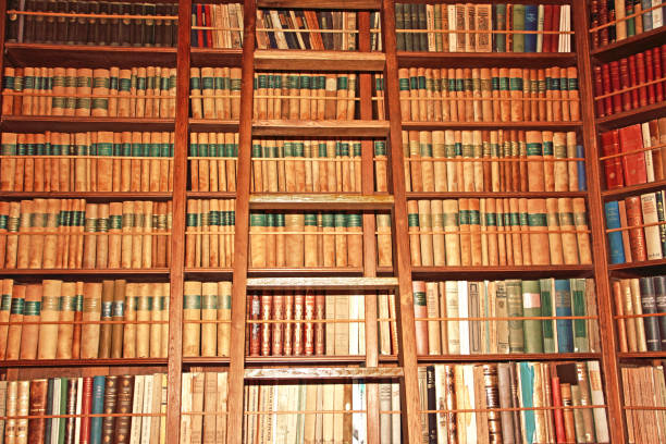 istock Old bookshelf with many different books 1345893023
