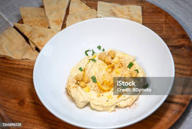 Homemade Hummus And Pita Stock Photo - Download Image Now - Appetizer, Bean, Bowl