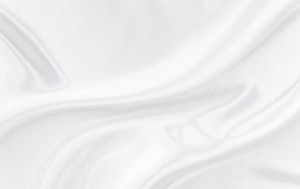 istock White gray satin texture that is white silver fabric silk background with beautiful soft blur pattern natural. 1345896443