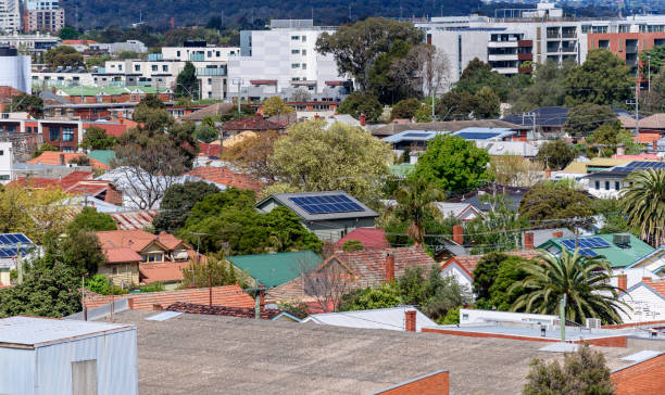 istock Solar panels on residential houses 1345906662