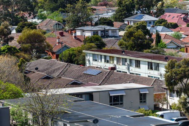 istock Solar panels on residential houses 1345906712
