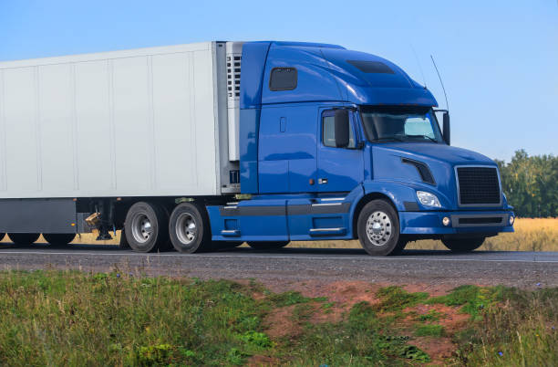 istock truck moves on highway 1345910880