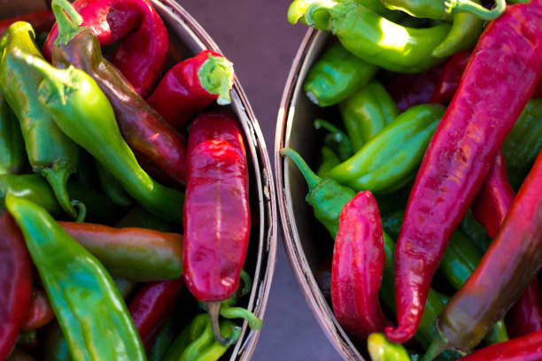 Red and green bell pepper at the grocery counter