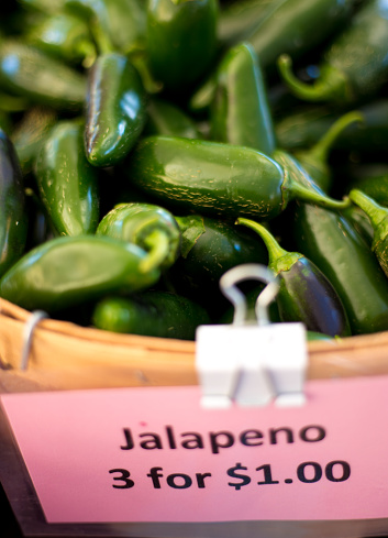 Jalapeno Chili Peppers in Basket, Sign with Price Tag. Shot in Santa Fe, NM.