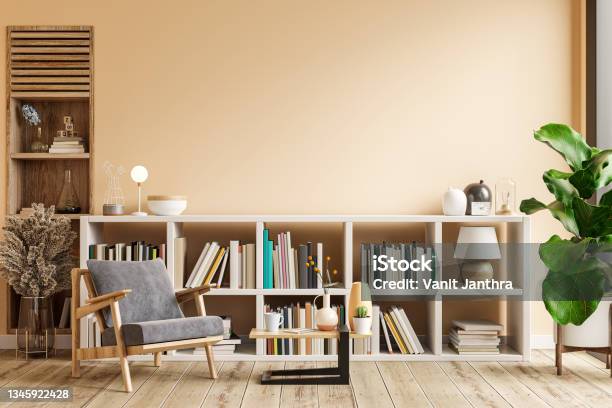 Interior Design Of Living Room With Armchair On Empty Light Cream Color Walllibrary Room Stock Photo - Download Image Now