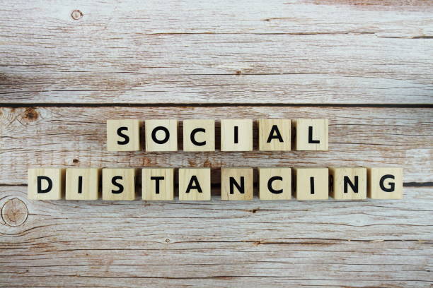 istock Social Distancing alphabet letter on wooden background 1345927358