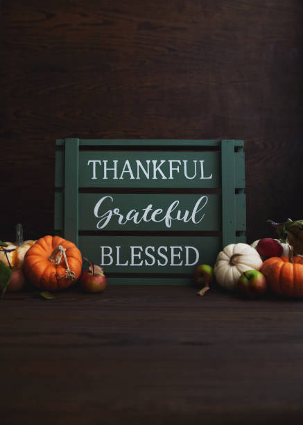 istock Thanksgiving Fall Still Life with Assorted Miniature Pumpkin and Green Crate with Message 1345928720