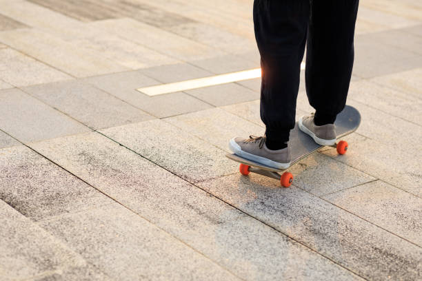 istock Skateboarder skateboarding outdoors in city 1345929892