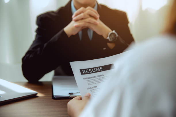 istock A woman submit a resume to boss. 1345932207