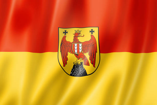 Photo of the Polish coat of arms, as seen on a public building in Warsaw, Poland. It is an image of a crowned white eagle in a red field.