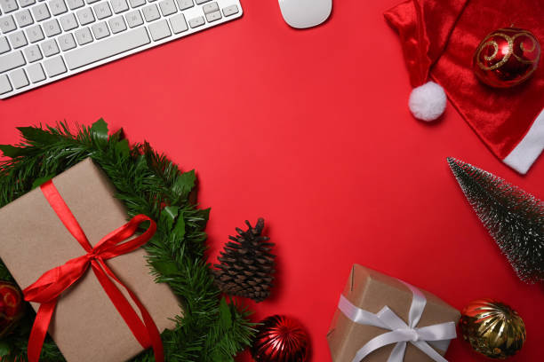 istock Above view Christmas gift boxes on red background. 1345933093