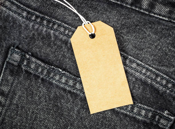 istock Tags on jeans, Concept sale, discount, black friday. 1345935397