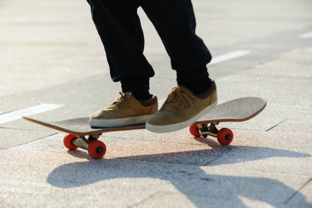 istock Skateboarder skateboarding outdoors in city 1345935571