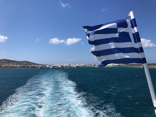 istock Greek flag at the back of a ferry 1345935633