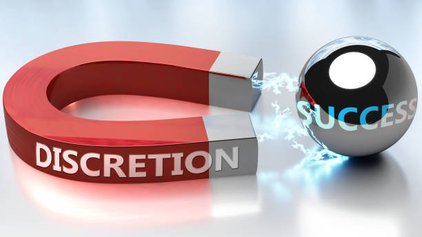 istock Discretion helps achieving success - pictured as word Discretion and a magnet, to symbolize that Discretion attracts success in life and business, 3d illustration 1345936490