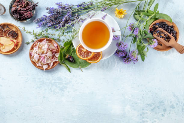istock Herbal tea, top shot with copy space. Herbs, flowers and fruit 1345937847