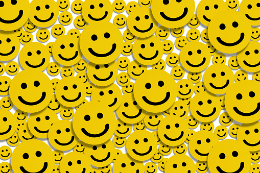 Happy smiley face emoticons on white background