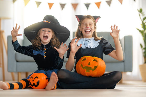 istock Happy family celebrating Halloween 1345946977