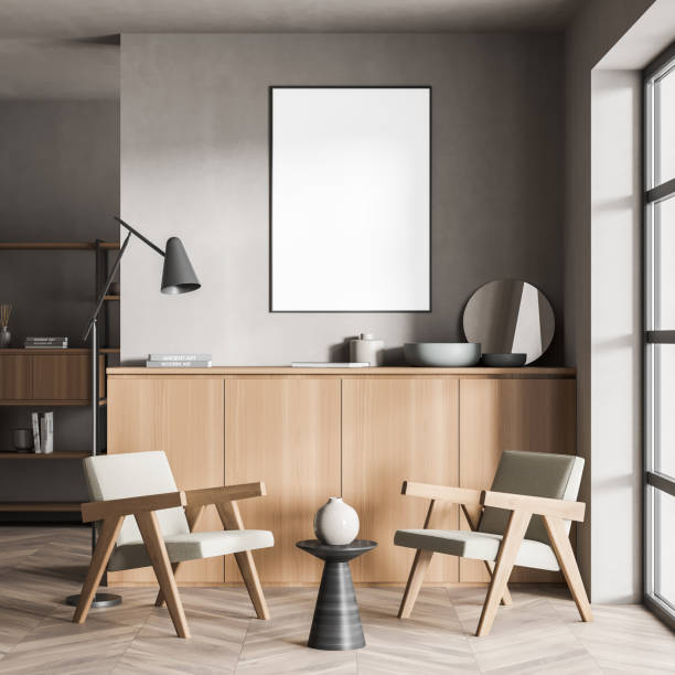 istock Seating area with canvas on grey beige living room wall 1345947377