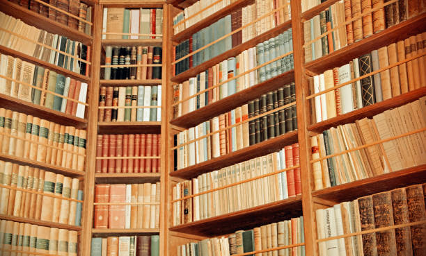 istock Old bookshelf with many different books 1345948696