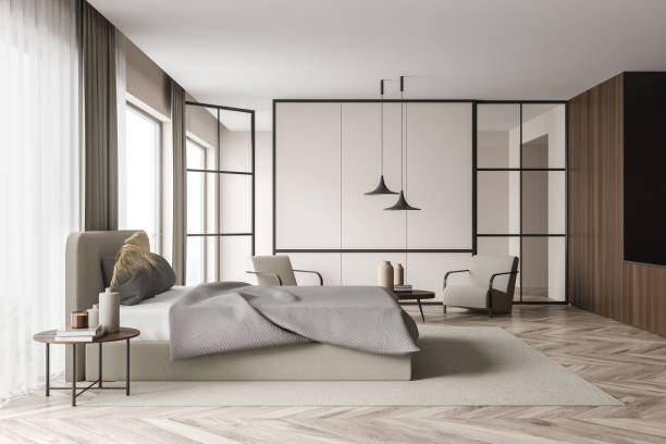 istock Beige bedroom with two on trend pendant lamps 1345948768