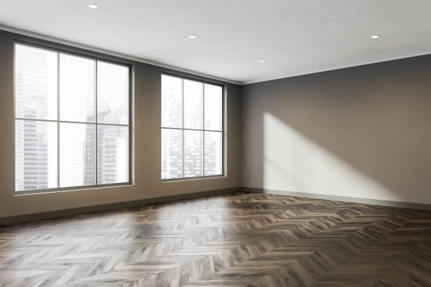 istock Corner of empty space in coffee shade with dark brown parquet flooring 1345948810