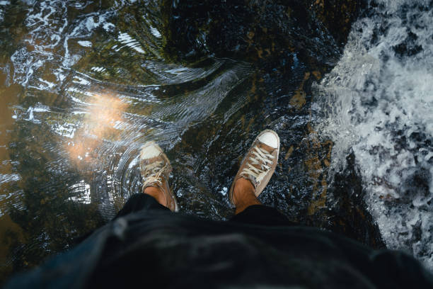 istock Waterfall in a tropical forest in the daytime 1345948905