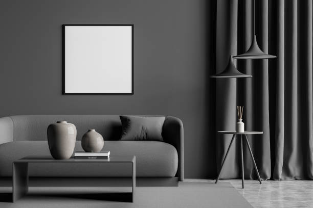 istock Dark grey living room with empty square canvas on wall 1345948928