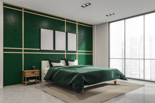istock Corner of bedroom with three banners on malachite green wall 1345950422