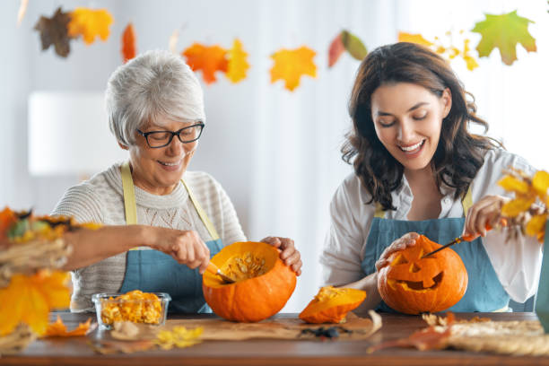 istock family preparing for Halloween 1345951642