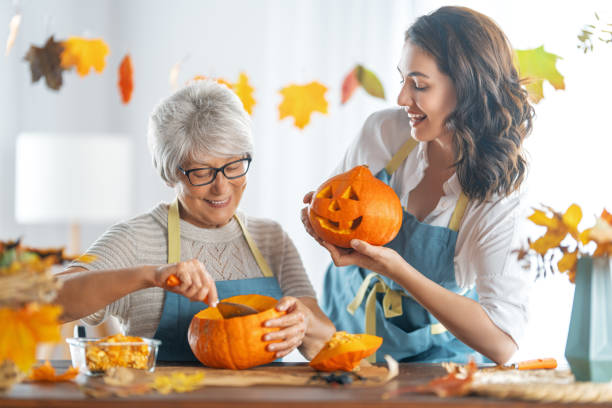 istock family preparing for Halloween 1345951655