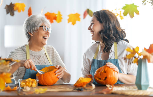 istock family preparing for Halloween 1345951765