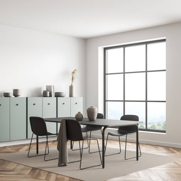 istock Panoramic living room with green sideboard and black table. Corner view. 1345951990