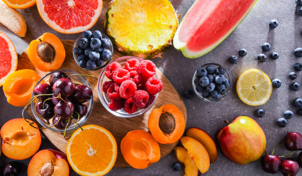 istock Composition with a variety of fresh culinary fruits 1345952447