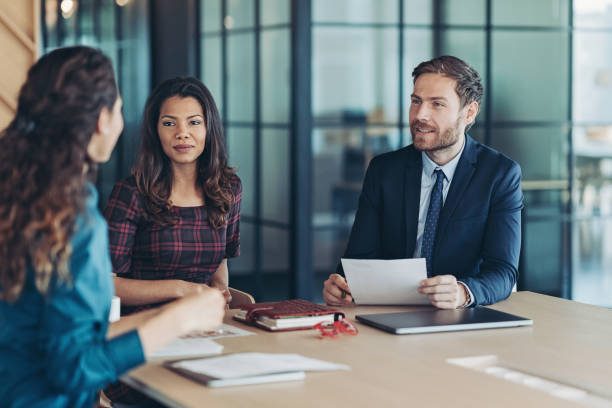 istock Entrepreneurs talking in the office 1345953236