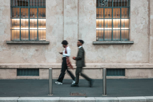 istock Business people walking to the office 1345953583