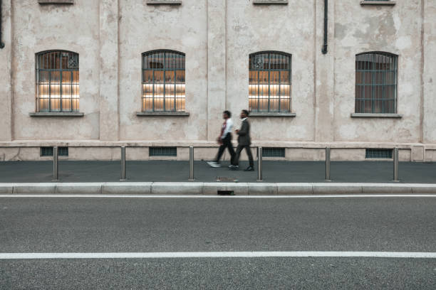 istock Business people walking to the office 1345953995