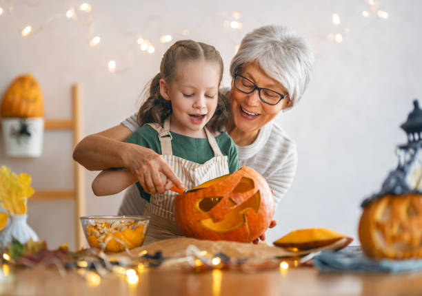 istock family preparing for Halloween 1345954781