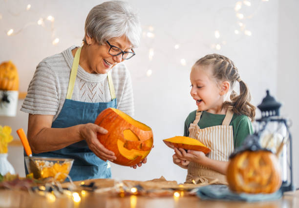 istock family preparing for Halloween 1345954935