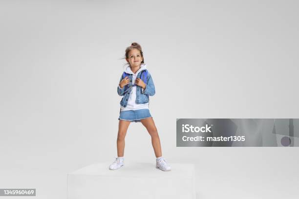 Stylish Girl In Full Growth On A White Background Stock Photo