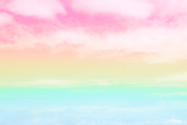istock Soft focus Cloud sky rainbow pastel with colorful pink, yellow, blue fantasy paint cloudscape. 1345963872