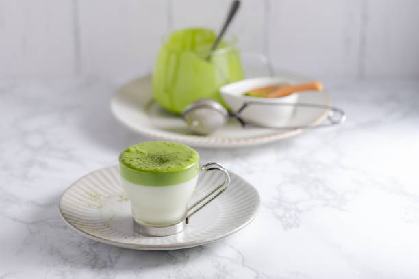 Homemade Dalgona matcha latte. A trendy drink from Korea.