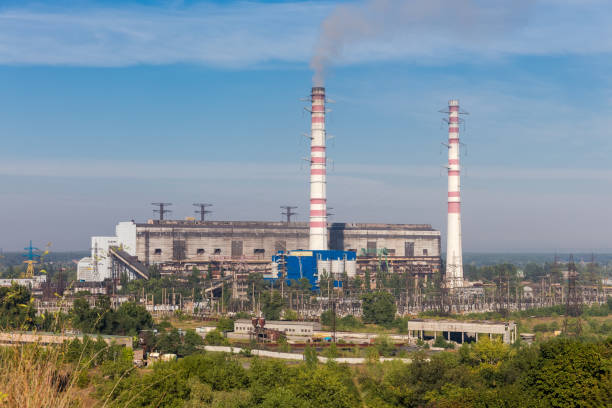 istock Fossil fuel thermal power station against the sky 1345965018