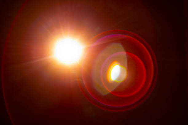 istock Sun flare on the black background 1345965213