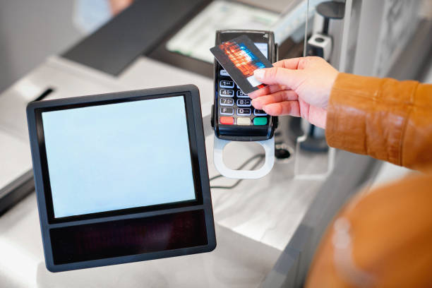 istock Paying by credit card at hotel checkout 1345965363