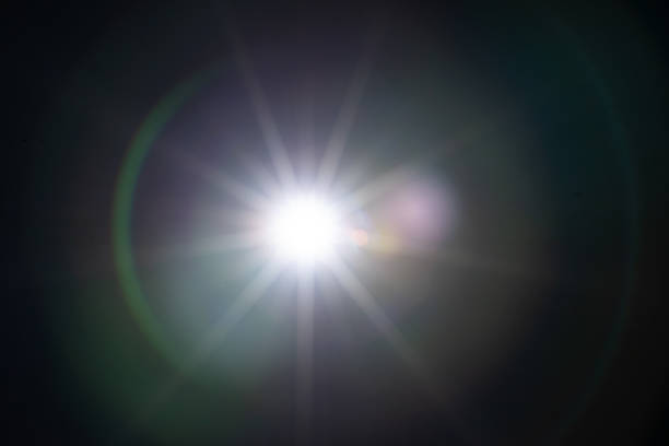 istock Sun flare on the black background 1345965438