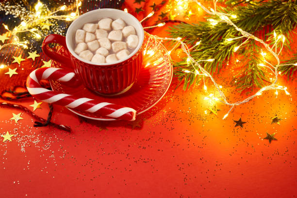 istock Christmas hot chocolate with marshmallow and candy cane 1345967765