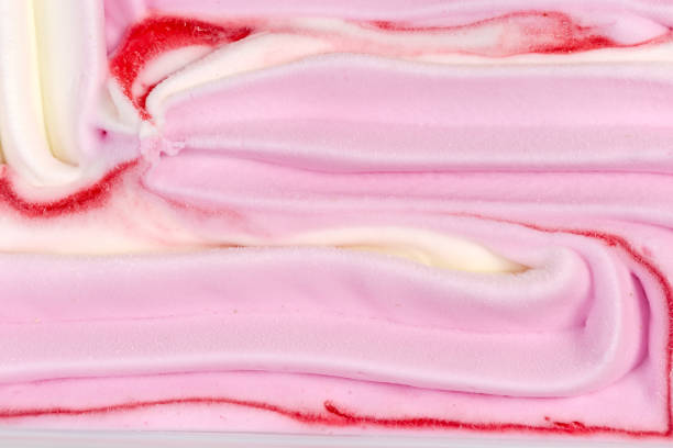 istock Surface of fruit ice cream in container, fragment close-up 1345968882