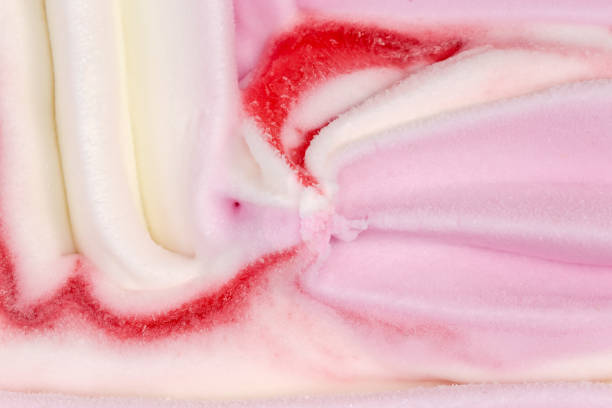 istock Surface of fruit ice cream in container, fragment close-up 1345968904