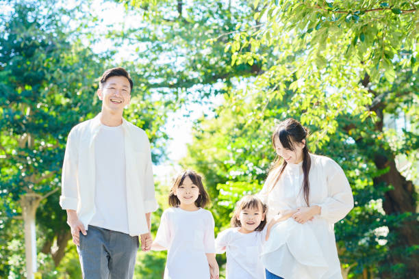 istock 4 family members taking a walk 1345971255